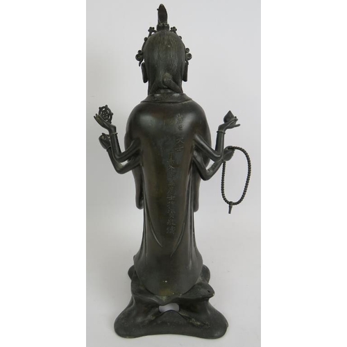 3 - An antique Chinese bronze figure of a Deity, probably the Buddhist Goddess Marici, with Chinese scri... 