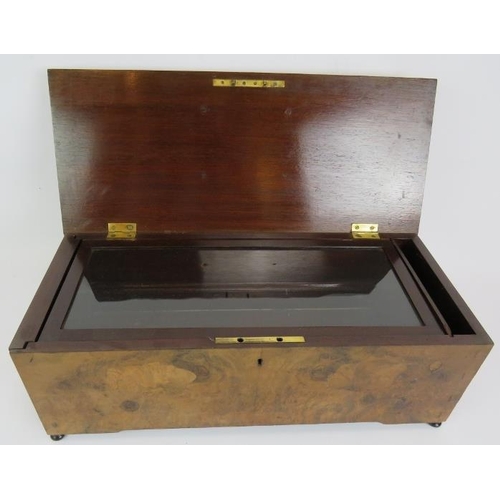 32 - An antique music box case with burr walnut veneer and inlaid lid. Internal glass cover and drop end ... 