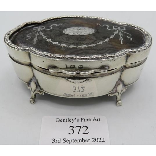 372 - A silver and tortoiseshell ring box with pique decoration of sways & bows, Birmingham 1946, Mappin &... 