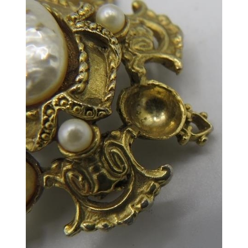 379 - A Miriam Haskell yellow metal & simulated pearl brooch, one other similar and a Tortolani yellow met... 