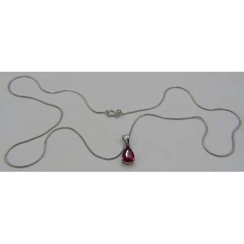 385 - A pair shaped ruby pendant on a 9ct white gold Italian chain, approx 8mm x 5mm, boxed. Approx weight... 