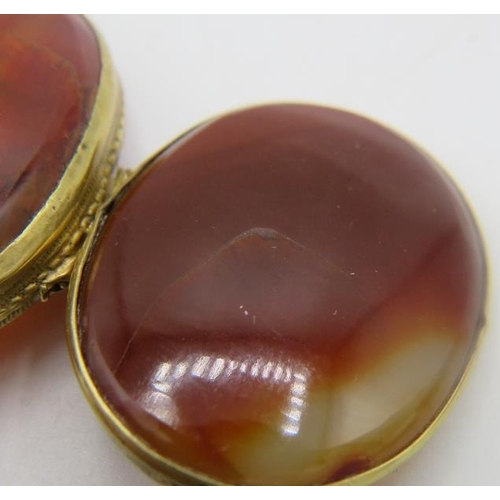 390 - An oval vintage amber pendant/brooch, approx 25mm x 40mm, an agate brooch and a double sided agate p... 