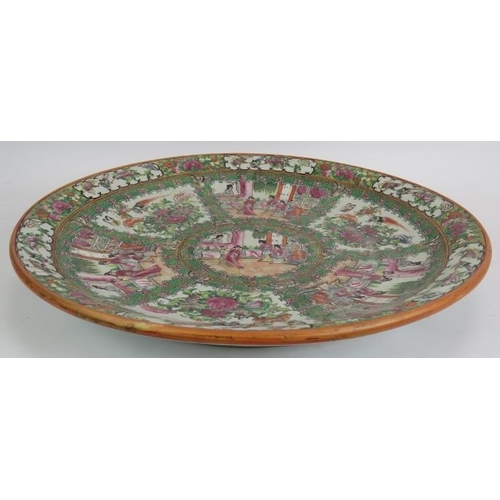 4 - A large Chinese canton porcelain Famille Rose charger hand decorated with birds, flowers and traditi... 