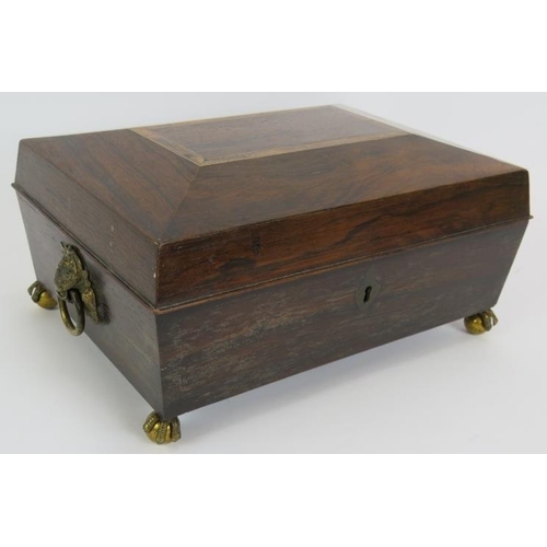 40 - A Regency rosewood workbox with gilt brass handles and ball and claw feet, and a box with plaque eng... 