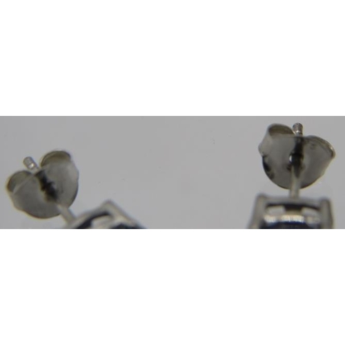 413 - A pair of iolite stud earrings, backs marked 925, approx weight 1. 4 grams.
Condition report: Good c... 