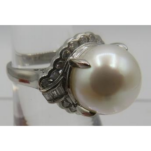 419 - A large platinum cultured pearl ring with baguette & round cut brilliant diamonds, size L. Diamonds ... 