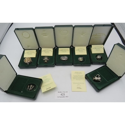 421 - 'The Royal Tunbridge Wells Miniatures', comprising of seven hallmarked sterling silver pieces, by Ma... 