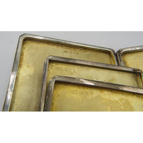 424 - A collection of three silver cigarette cases with engine turned decoration. One Royal Army Medical C... 