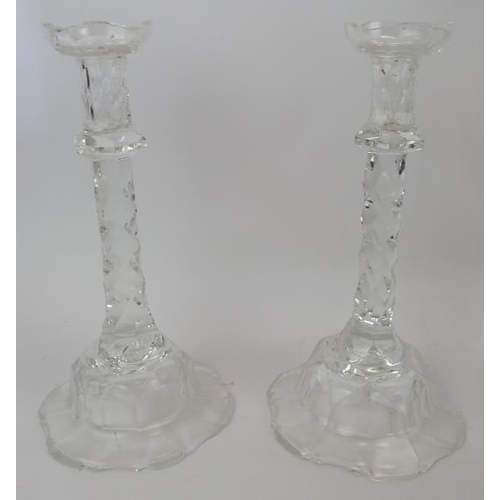 425 - A pair of cut crystal glass candlesticks, two spirit decanters, one with hallmarked silver collar, t... 