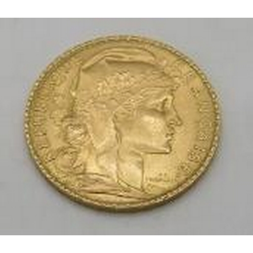 428 - A 1911 Republique Francaise 20 francs gold coin, approx weight 6.5 grams.
Condition report: Slight s... 