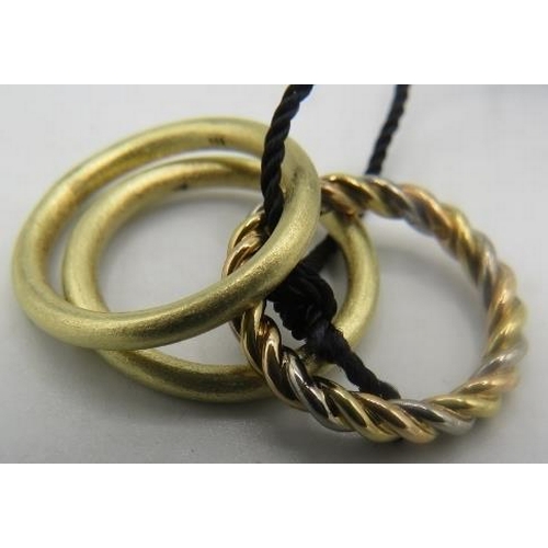 434 - Three gold stacking rings. The rope design white & yellow gold ring 18ct and the two plainer rings 1... 