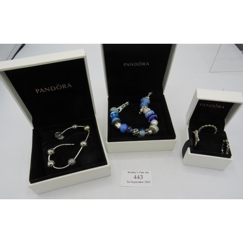 443 - A Pandora 'Blue' collectors bracelet, a Pandora 'Essence' bracelet with ball charms and three Pandor... 