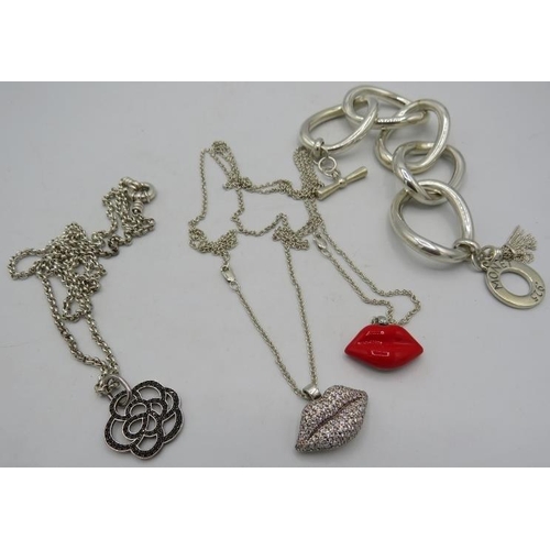 445 - Two Thomas Sabo double lip necklaces, one red enamel lipped, the other encrusted with white stones, ... 