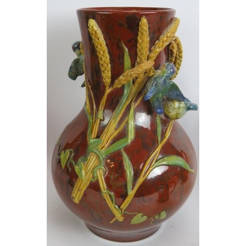 46 - A large 19th century Brownfield pottery vase with applied birds and wheat ears, two green pottery ow... 