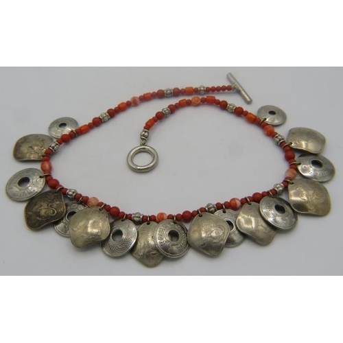 461 - A Nepalese bead, coral & coin tribal necklace with sterling silver clasp. Approx 18