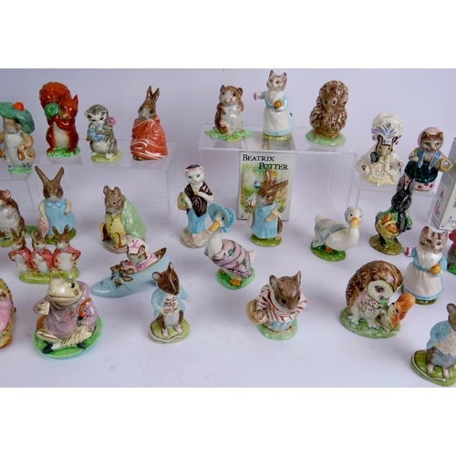 48 - A large collection of Beswick pottery Beatrix Potter figures, 34 in total. Tallest 11cm.
Condition r... 