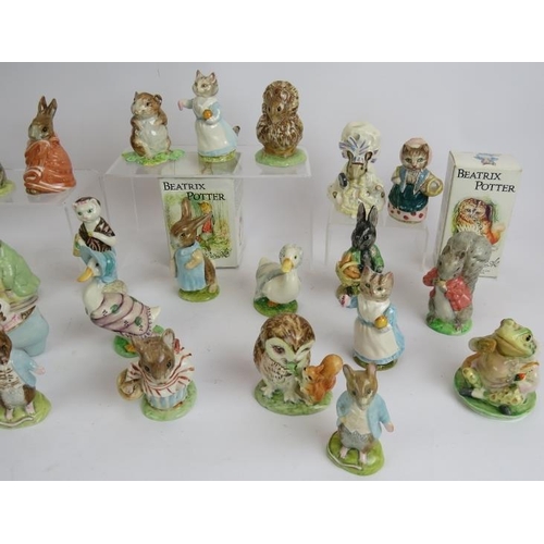 48 - A large collection of Beswick pottery Beatrix Potter figures, 34 in total. Tallest 11cm.
Condition r... 