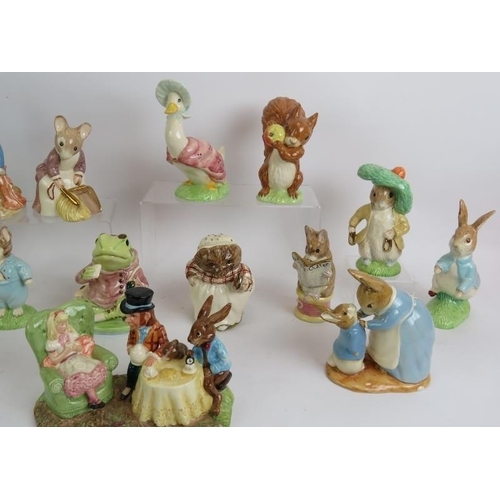 49 - A collection of Beswick pottery limited edition Beatrix Potter figures plus a Mad Hatter's tea party... 