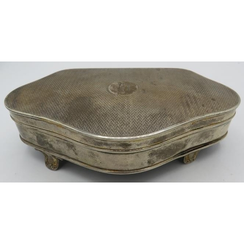 491 - A silver trinket box on four feet, approx 7