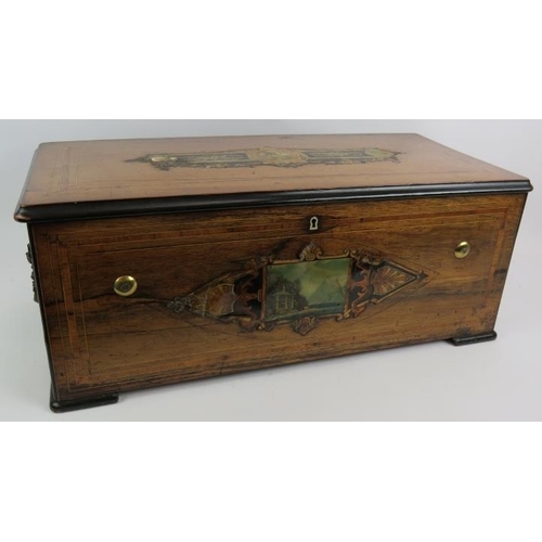 53 - A Bremond music box, No 37500 with six bells with bird strikers and drum, playing 8 airs in rosewood... 