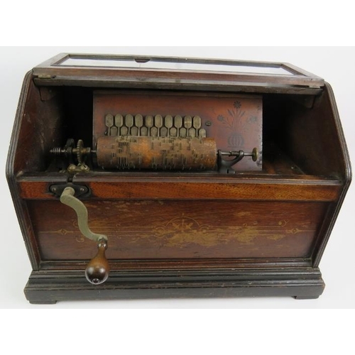 55 - A late 19th century cabinet roller organ by the Autophone Company, New York. Painted oak glazed cabi... 