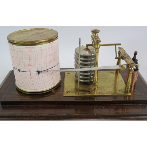 62 - An oak framed glazed cased barograph with key and ink bottle. 38cm x 23cm x 19cm.
Condition report: ... 