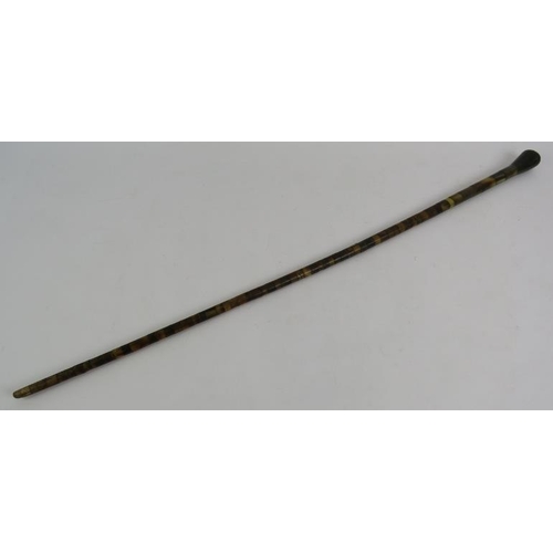 63 - An antique walking cane consisting of graduated sectional horn pieces. Length 86cm. 
Condition repor... 