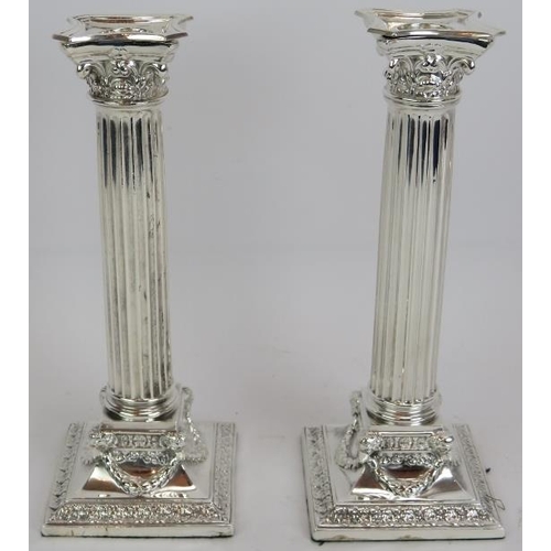 69 - A fine pair of antique silver plated Corinthian column candlesticks and a four candle candelabra wit... 