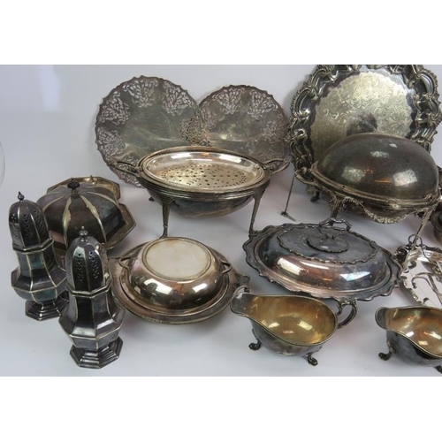 77 - A quantity of mainly antique silver plated serving ware including a salver, covered dishes, sugar ca... 