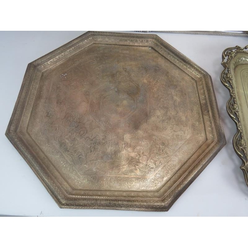 80 - Two large Edwardian silver plated butler's trays, two further plated trays and an octagonal decorate... 