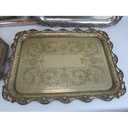 80 - Two large Edwardian silver plated butler's trays, two further plated trays and an octagonal decorate... 