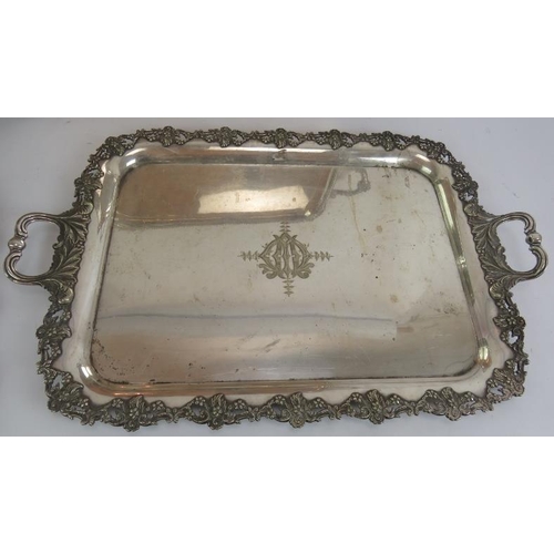 80 - Two large Edwardian silver plated butler's trays, two further plated trays and an octagonal decorate... 