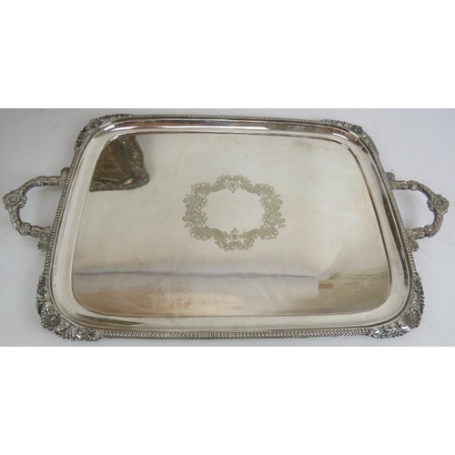 80 - Two large Edwardian silver plated butler's trays, two further plated trays and an octagonal decorate... 