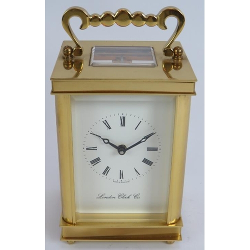 84 - A brass cased 8 day English carriage clock by the London Clock Co. Height 14.5cm. Key present.
Condi... 