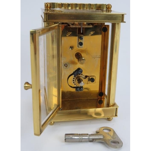 84 - A brass cased 8 day English carriage clock by the London Clock Co. Height 14.5cm. Key present.
Condi... 