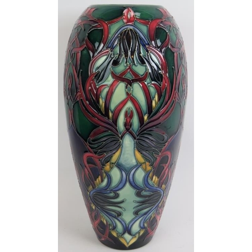 88 - A large limited edition Moorcroft pottery vase of floriate design, signed W Manon 12/150. Height 37c... 