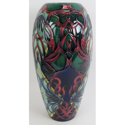 88 - A large limited edition Moorcroft pottery vase of floriate design, signed W Manon 12/150. Height 37c... 