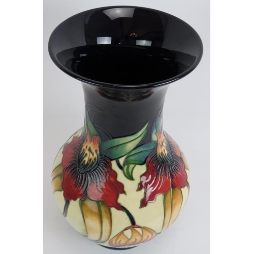 89 - A large Moorcroft pottery baluster vase of Anna Lily design, signed by Nicola Slaney 1998. Height 33... 