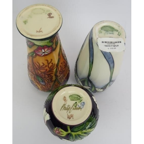 92 - Three contemporary Moorcroft pottery vases, one signed by Philip Gibson. Tallest 21cm. 
Condition re... 