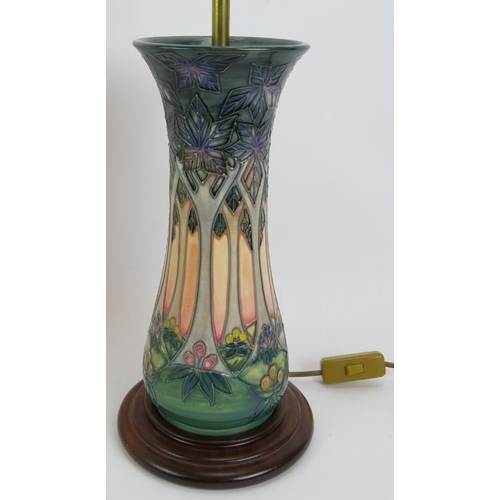 93 - A Moorcroft pottery lamp base and shade. 'Cluny' Art Deco tree pattern. Base height 34cm. Overall he... 