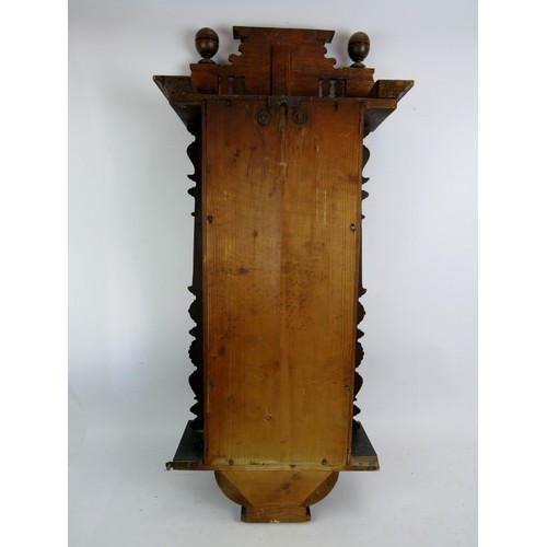 157 - A late 19th/early 20th century Continental Vienna type striking wall clock in walnut glazed case. Ke... 