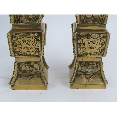 156 - A pair of early 20th century Chinese archaic Revival brass Gu vases of square form. Height 19.5cm. (... 