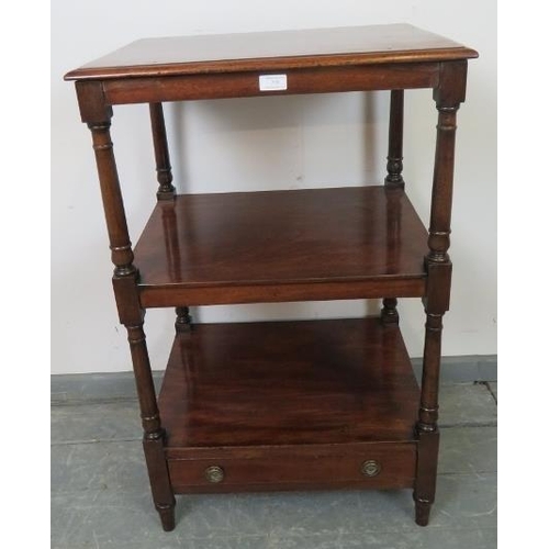 729 - An early Victorian mahogany three tier whatnot, the top tier featuring an adjustable bookrest/lecter... 