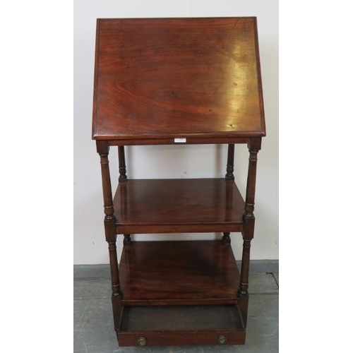 729 - An early Victorian mahogany three tier whatnot, the top tier featuring an adjustable bookrest/lecter... 