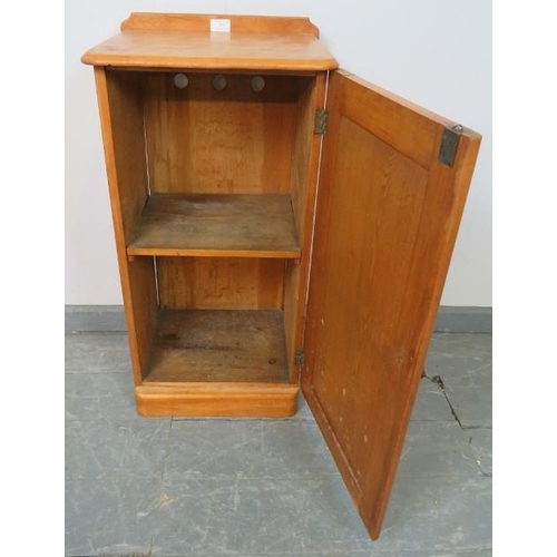 735 - A Victorian satin walnut bedside cabinet, with loose internal shelf, on a plinth base. 
Condition re... 