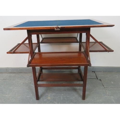 736 - An Edwardian walnut crossbanded campaign inspired turnover card table with inset blue baize and fold... 