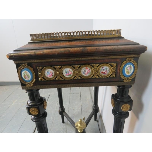 737 - A 19th century Napoleon III ebonised and burr walnut plant stand with brass gallery rail, ormolu mou... 