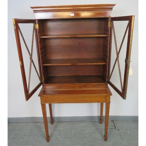 739 - An Edwardian mahogany display cabinet on stand, strung with satinwood and featuring coromandel cross... 