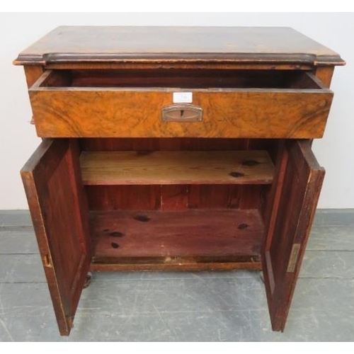 748 - A Victorian burr walnut and mahogany side cabinet, featuring carved corbels, with one long frieze dr... 