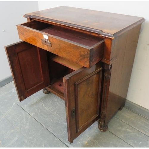 748 - A Victorian burr walnut and mahogany side cabinet, featuring carved corbels, with one long frieze dr... 